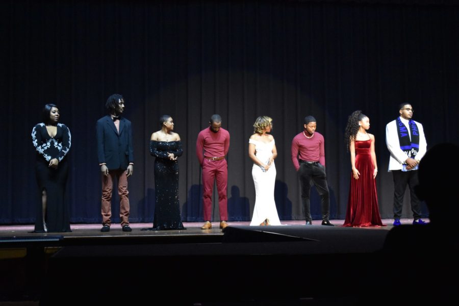 From left to right: Kent State Students Sydney Evans, William Barrett, Larjae’ Cohen, Trinity Tyler, Latrice Johnson, Paul Jetter, Kristal Moseley and C.J. Owensby all wait to see who will be crowned king, queen, prince and princess at 50th Annual Renaissance Ball.